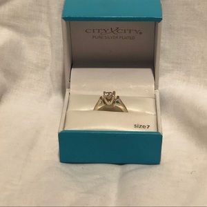 Size 7 CZ ring set in Sterling Silver